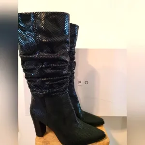 Beautiful patent leather IRO boots.