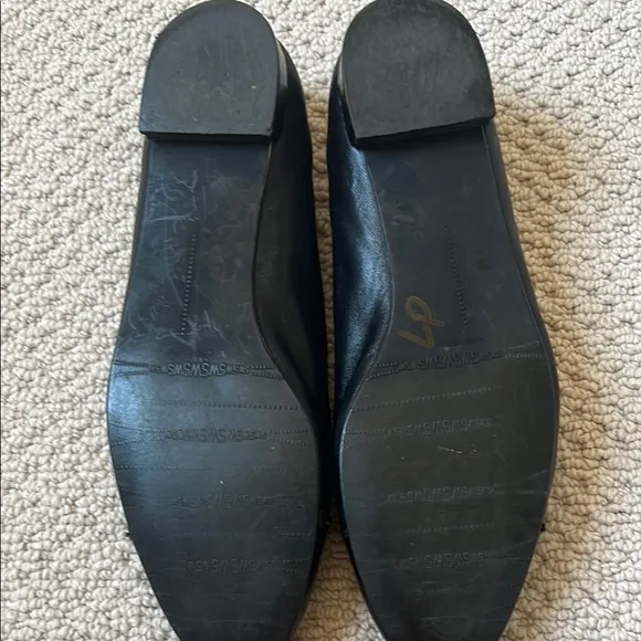Elegant Black and Brown Stuart Weitzman Flats