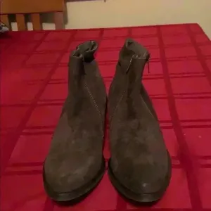 Free People women’s ankle suede boots.
