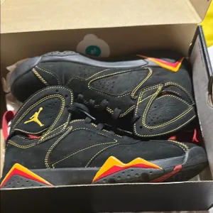 Jordan Black and Yellow Sneakers Iconic Design