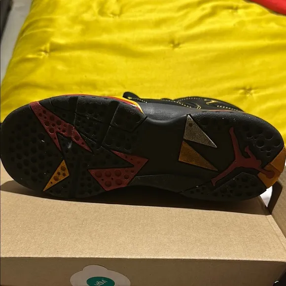 Jordan Black and Yellow Sneakers Iconic Design