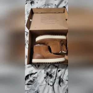 Koolaburra Tan Boots with Suede Upper and White Sole