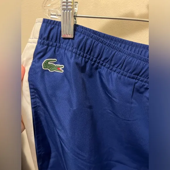 Lacoste lined zipper bottom track pants sz XL‎