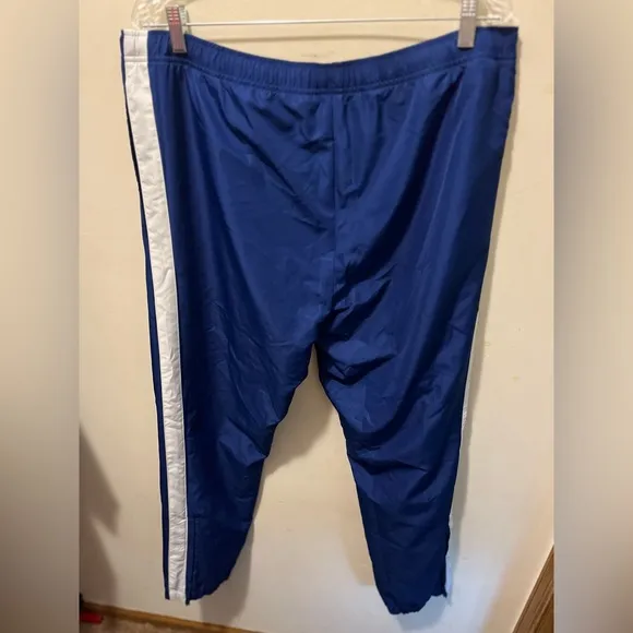 Lacoste lined zipper bottom track pants sz XL‎