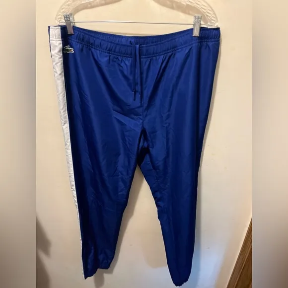 Lacoste lined zipper bottom track pants sz XL‎