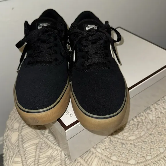 NIKE SB. Black w/gum sole. Size:9 Men’s. W/o box. Excellent condition