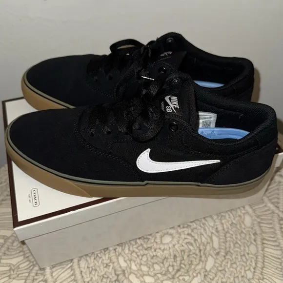 NIKE SB. Black w/gum sole. Size:9 Men’s. W/o box. Excellent condition