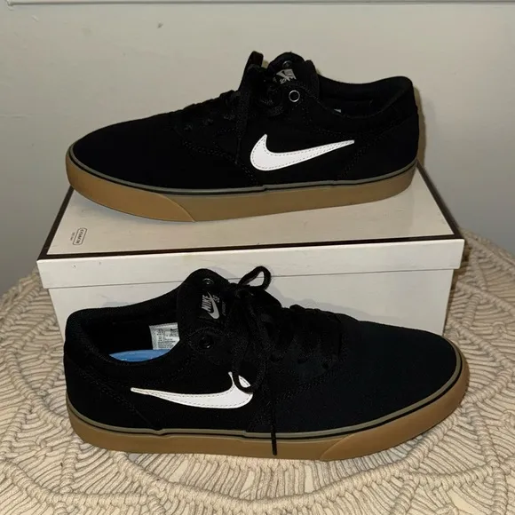 NIKE SB. Black w/gum sole. Size:9 Men’s. W/o box. Excellent condition