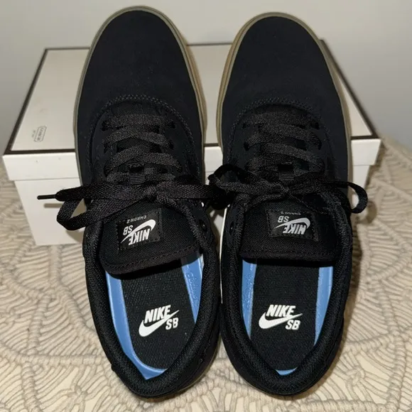 NIKE SB. Black w/gum sole. Size:9 Men’s. W/o box. Excellent condition