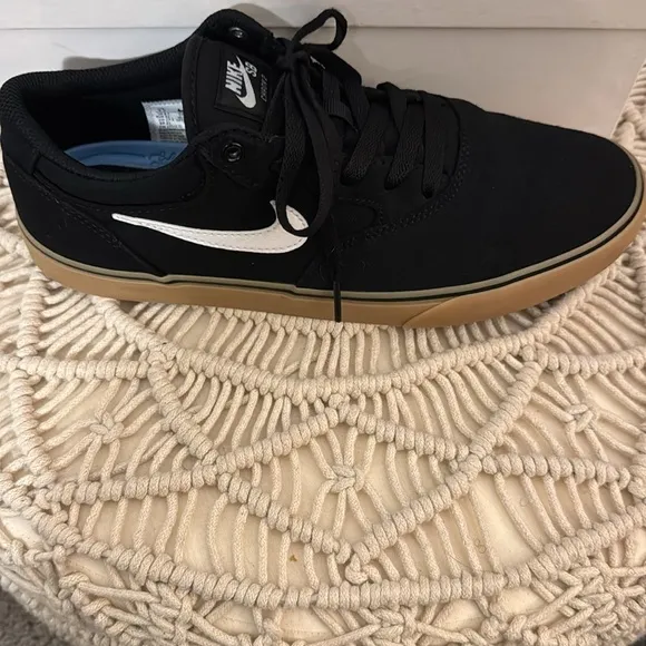 NIKE SB. Black w/gum sole. Size:9 Men’s. W/o box. Excellent condition