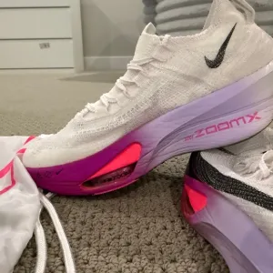 Nike White and Pink Athletic Shoes with ZoomX Technology(wore one time)