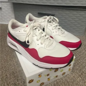 Pink and White Nike Airs