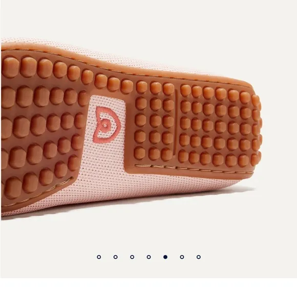 Pink Rothy’s flats knot detail