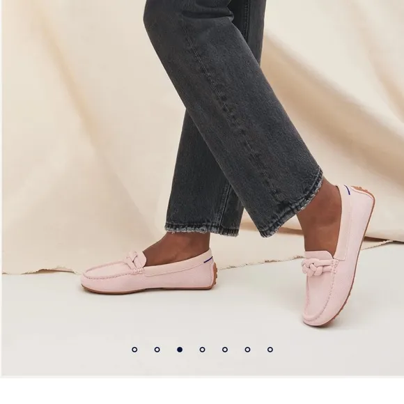 Pink Rothy’s flats knot detail