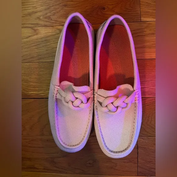 Pink Rothy’s flats knot detail