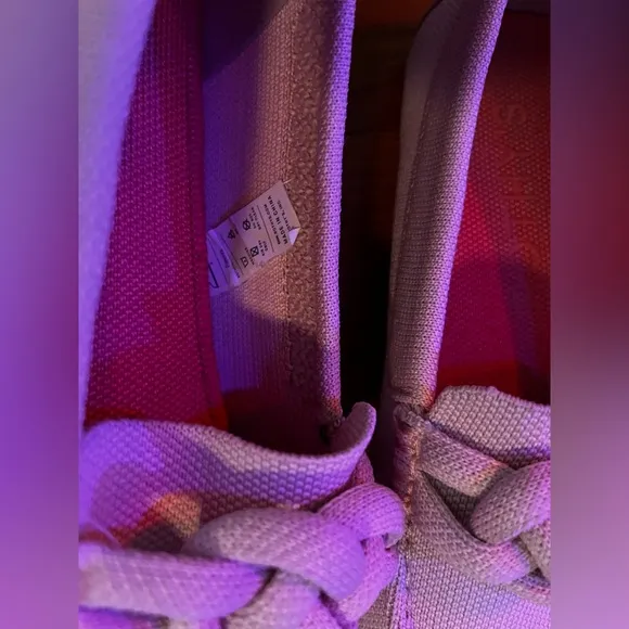 Pink Rothy’s flats knot detail