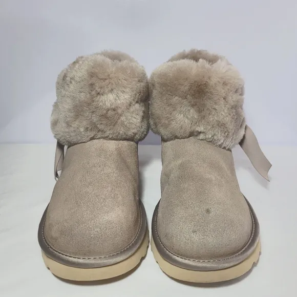 UGG Women's Size 9 Cinched fur mini boots.