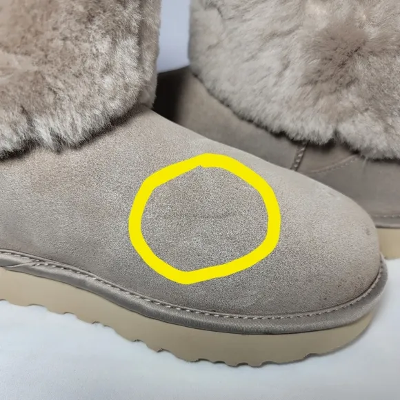 UGG Women's Size 9 Cinched fur mini boots.