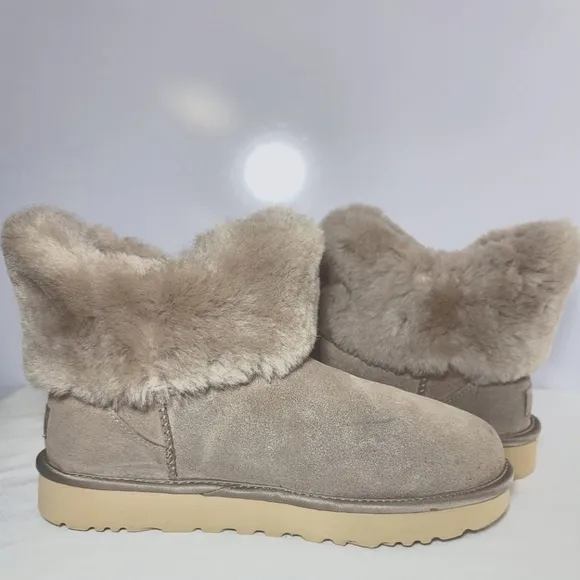UGG Women's Size 9 Cinched fur mini boots.